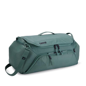 Thule green duffel bag with top handle and front zippered pocket