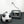 Wagan AC DC digital tire inflator plugged into a wall outlet and connected to a soccer ball
