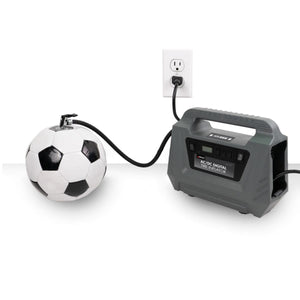 Wagan AC DC digital tire inflator connected to a wall outlet and inflating a soccer ball