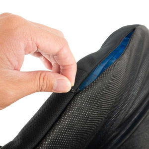 Hand opening the zipper on a Wagan gel seat cushion