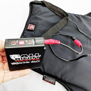All Mighty Heated battery pack connected to a black heated pad