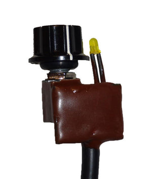 Warm and Safe heat controller with black dial and yellow LED indicator