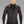 Man wearing a black Warm and Safe long sleeve base layer with red stitching and a quarter zip collar