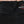 Close up of black Warm and Safe Heated Gear shirt collar with red stitching