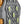 Winter Walking ice cleat tread with metal studs and yellow circular accents