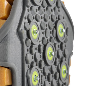 Winter Walking ice cleat tread with metal studs and yellow circular accents