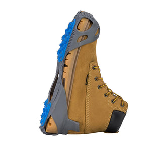 Winter Walking ice cleats attached to a tan work boot