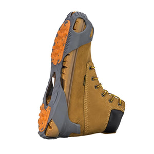 Winter Walking ice cleat attached to a tan work boot