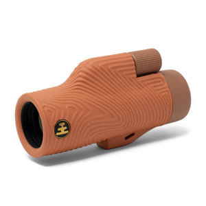 NOCS Provisions monocular with textured brown grip and focus wheel