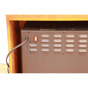 Back view of an electric fireplace insert with a power cord and illuminated red switch