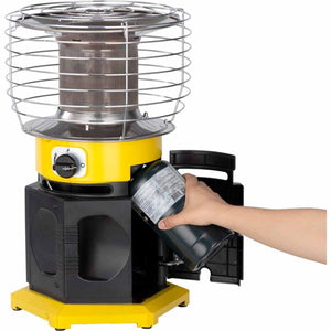 Hand inserting a propane canister into a yellow and black portable heater