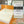 Shield Life mattress pad showing six internal material layers including cotton top and carbonized copper mesh