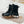 Black Icebite waterproof work boots covered in mud and snow
