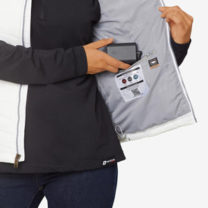 Person placing a Venture Heat battery pack into the interior pocket of a heated jacket
