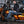 Man sitting on a copper Harley Davidson motorcycle wearing a Gerbing heated jacket