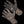 Stormr camouflage gloves with black hexagonal grip pattern on palms