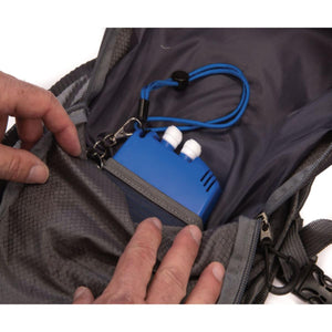 Blue water pump device inside a grey backpack pocket