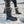 Two people wearing Baffin winter boots walking on snow