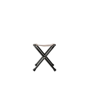 Snow Peak folding stool with black metal frame and tan fabric seat
