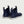 Huk navy blue ankle boots with white soles and pull tabs