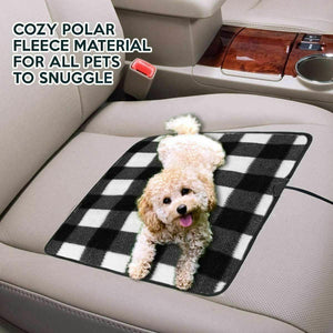 Zone Tech black and white plaid polar fleece pet mat on a car seat with a small dog lying on it