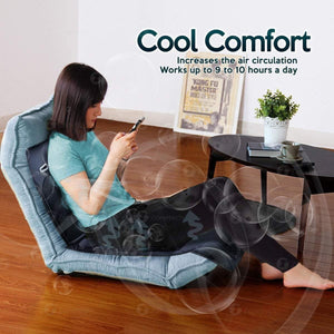 Zone Tech cooling seat cushion on a floor chair with a woman using a phone