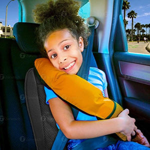 Child resting head on a Zone Tech yellow seat belt pillow in a car