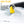 Zone Tech yellow round ice scraper clearing snow from a car windshield